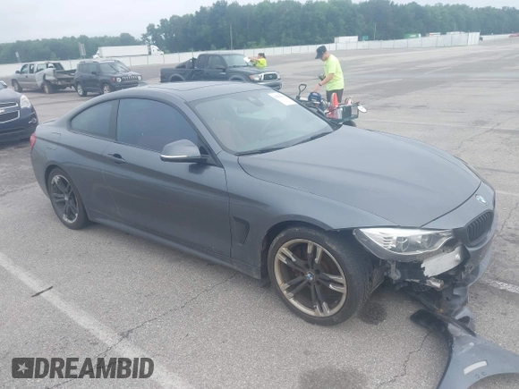 2014 BMW 4 Series 428i with VIN WBA3N7C52EK221929, listed as a IAAI auction lot 42530110 with 126,828 mi miles and . Bid and sale history available at DreamBid. Image 1.
