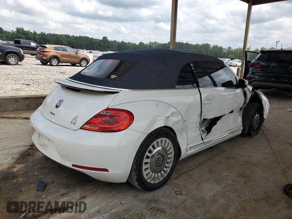 2016 Volkswagen Beetle Denim с VIN 3VW507AT7GM814044, выставлен на аукционе Copart как лот 59352315 с пробегом Не указан миль и Списание • Salvage title. История ставок и продаж доступна на DreamBid. Изображение 3.