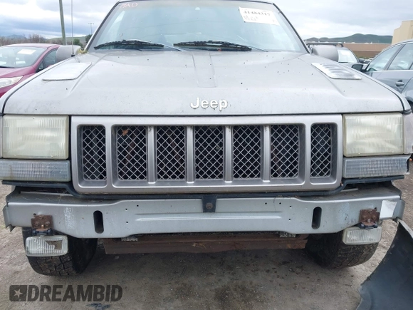 1998 Jeep Grand Cherokee Limited with VIN 1J4GZ88Z7WC223496, listed as a IAAI auction lot 41484317 with 244,567 mi miles. Bid and sale history available at carsss.com. Image 6.