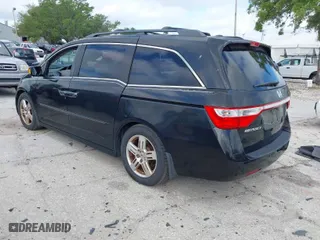 2013 Honda Odyssey Touring with VIN 5FNRL5H92DB003200, listed as a IAAI auction lot 41920237 with 167,483 mi miles. Bid and sale history available at carsss.com. Image 3.