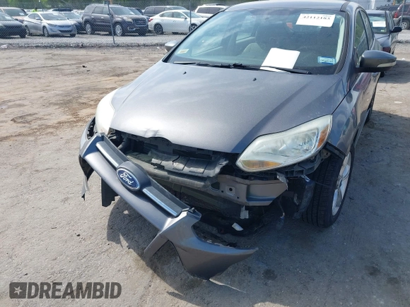 2013 Ford Focus SE with VIN 1FADP3K20DL193712, listed as a IAAI auction lot 42112183 with 113,500 mi miles. Bid and sale history available at carsss.com. Image 6.