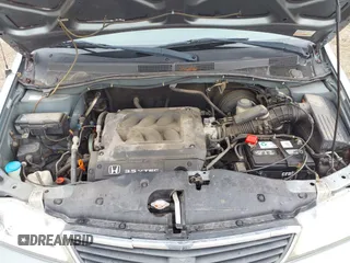 2000 Honda Odyssey EX z VIN 2HKRL1879YH516264, wystawiony jako IAAI lot #42109480 z przebiegiem 214 414 mil mil oraz . Historia ofert i sprzedaży dostępna na DreamBid. Obrazek 10.