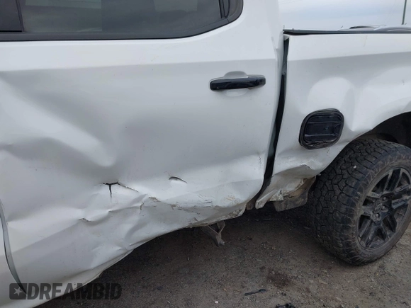 2023 Chevrolet Silverado 1500 LT Trail Boss with VIN 3GCUDFE82PG145067, listed as a IAAI auction lot 41380162 with 34,623 mi miles and . Bid and sale history available at DreamBid. Image 6.
