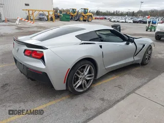 2015 Chevrolet Corvette Z51 3LT z VIN 1G1YM2D74F5114985, wystawiony jako IAAI lot #42077336 z przebiegiem 52 965 mil mil oraz . Historia ofert i sprzedaży dostępna na DreamBid. Obrazek 4.
