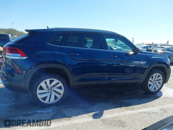 2021 Volkswagen Atlas SE z VIN 1V2KE2CA7MC220524, wystawiony jako IAAI lot #42017287 z przebiegiem 29 380 mil mil oraz . Historia ofert i sprzedaży dostępna na DreamBid. Obrazek 13.