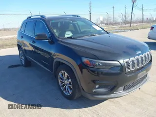 2019 Jeep Cherokee Latitude Plus with VIN 1C4PJLLB6KD249067, listed as a IAAI auction lot 41618590 with 176,445 mi miles. Bid and sale history available at carsss.com. Image 1.
