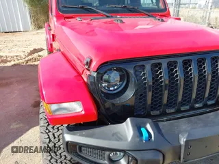 2024 Jeep Wrangler Sport S with VIN 1C4RJXN64RW141013, listed as a IAAI auction lot 42806441 with 5,893 mi miles and . Bid and sale history available at DreamBid. Image 6.