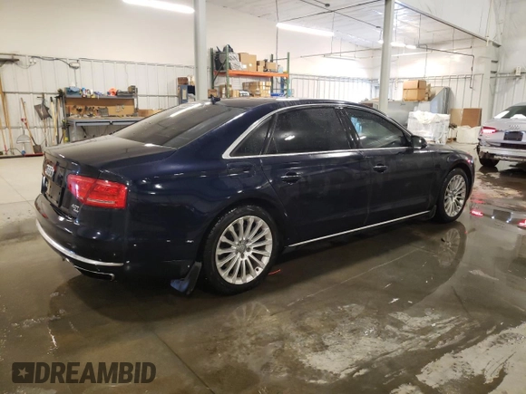 2014 Audi A8 4.0T with VIN WAUR2AFD8EN006198, listed as a Copart auction lot 85272544 with 105,058 mi miles and Salvage Title. Bid and sale history available at DreamBid. Image 3.