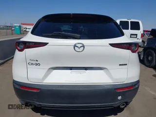 2021 Mazda CX-30 S with VIN 3MVDMAAL5MM303944, listed as a IAAI auction lot 41687532 with 35,379 mi miles and . Bid and sale history available at DreamBid. Image 17.