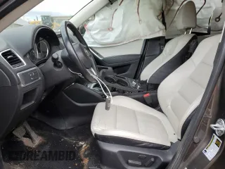 2016 Mazda CX-5 Grand Touring with VIN JM3KE4DY5G0848717, listed as a Copart auction lot 53249895 with 86,746 mi miles and Salvage Title. Bid and sale history available at carsss.com. Image 7.
