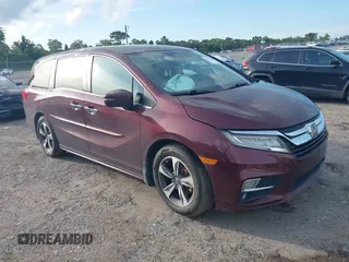 2019 Honda Odyssey Touring with VIN 5FNRL6H81KB104769, listed as a IAAI auction lot 42694506 with 108,143 mi miles and . Bid and sale history available at DreamBid. Image 1.