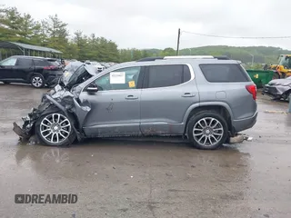 2021 GMC Acadia Denali z VIN 1GKKNXLS1MZ160927, wystawiony jako IAAI lot #42335027 z przebiegiem 60 014 mil mil oraz . Historia ofert i sprzedaży dostępna na DreamBid. Obrazek 13.