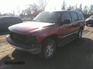 2004 Chevrolet Tahoe LT z VIN 1GNEC13Z04J318074, wystawiony jako IAAI lot #41755717 z przebiegiem 186 254 mil mil oraz . Historia ofert i sprzedaży dostępna na DreamBid. Obrazek 2.
