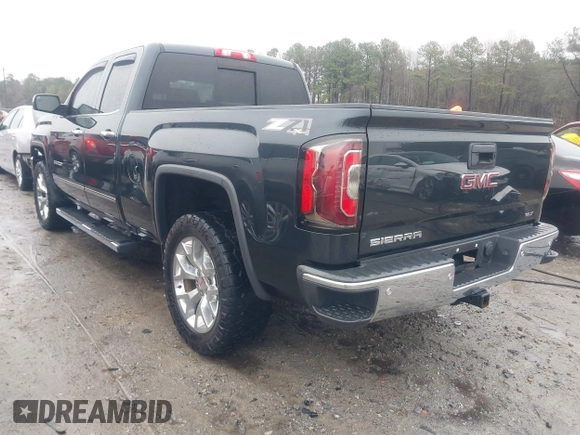 2017 GMC Sierra 1500 SLT z VIN 1GTV2NEC5HZ180843, wystawiony jako IAAI lot #41509410 z przebiegiem 89 943 mil mil oraz . Historia ofert i sprzedaży dostępna na DreamBid. Obrazek 3.