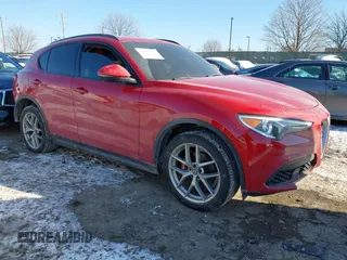 2019 Alfa Romeo Stelvio z VIN ZASPAKAN9K7C49108, wystawiony jako IAAI lot #41365234 z przebiegiem 53 196 mil mil oraz . Historia ofert i sprzedaży dostępna na DreamBid. Obrazek 1.