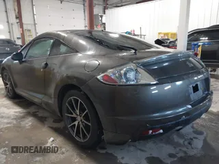 2012 Mitsubishi Eclipse GS with VIN 4A31K5DF6CE005699, listed as a IAAI auction lot 41582872 with 153,991 mi miles and . Bid and sale history available at DreamBid. Image 3.