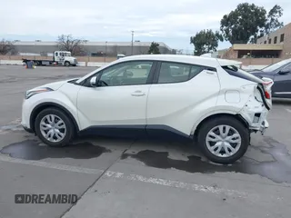 2021 Toyota C-HR LE with VIN JTNKHMBX1M1098521, listed as a IAAI auction lot 41539775 with 14,840 mi miles. Bid and sale history available at carsss.com. Image 15.