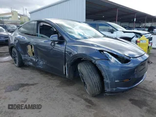 2022 Tesla Model Y Long Range with VIN 7SAYGAEE6NF341827, listed as a IAAI auction lot 41946388 with Not Provided miles and . Bid and sale history available at DreamBid. Image 1.