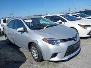 2016 Toyota Corolla L z VIN 5YFBURHE0GP523147, wystawiony jako IAAI lot #41862160 z przebiegiem 45 760 mil mil oraz . Historia ofert i sprzedaży dostępna na DreamBid. Obrazek 1.