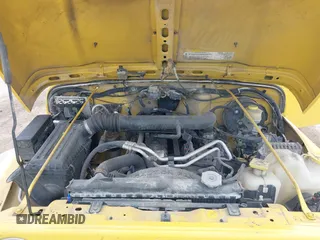 2004 Jeep Wrangler Sport z VIN 1J4FA49S04P701986, wystawiony jako IAAI lot #42256648 z przebiegiem 129 946 mil mil oraz . Historia ofert i sprzedaży dostępna na DreamBid. Obrazek 10.