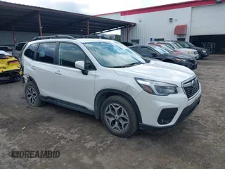 2021 Subaru Forester Premium z VIN JF2SKAJC8MH510932, wystawiony jako IAAI lot #38412558 z przebiegiem 57 763 mil mil oraz . Historia ofert i sprzedaży dostępna na DreamBid. Obrazek 1.