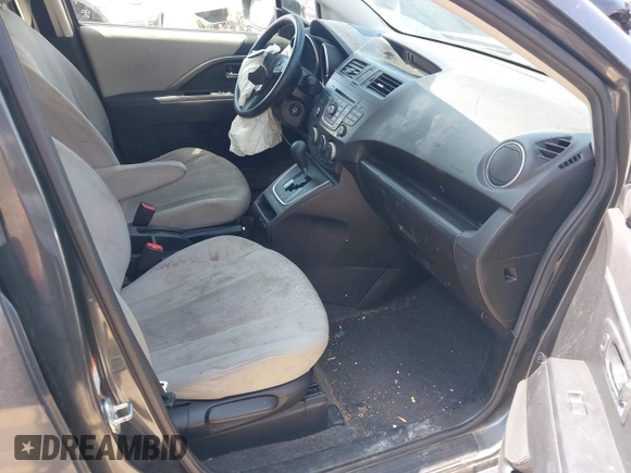 2012 Mazda 5 Sport with VIN JM1CW2BL1C0116150, listed as a IAAI auction lot 42571812 with 124,236 mi miles and . Bid and sale history available at DreamBid. Image 5.