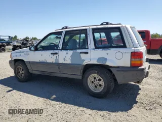 1993 Jeep Grand Cherokee Laredo с VIN 1J4GZ58S2PC654248, выставлен на аукционе Copart как лот 61259735 с пробегом 251 360 миль миль и Списание • Salvage title. История ставок и продаж доступна на DreamBid. Изображение 2.