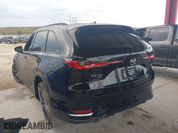 2025 Mazda CX-70 Premium Plus with VIN JM3KJEHA2S1111590, listed as a IAAI auction lot 41650609 with 5,377 mi miles and . Bid and sale history available at DreamBid. Image 3.