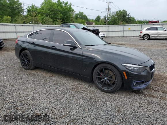 2019 BMW 4 Series 430i xDrive with VIN WBA4J3C50KBL10922, listed as a Copart auction lot 56553475 with 99,685 mi miles and Salvage title. Bid and sale history available at DreamBid. Image 4.