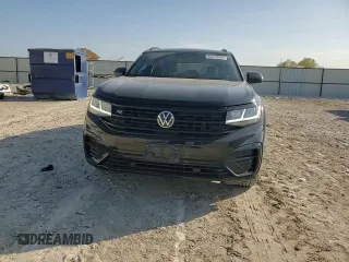 2023 Volkswagen Atlas SEL z VIN 1V2SE2CA0PC220790, wystawiony jako Copart lot #85270934 z przebiegiem 32 394 mil mil oraz Szkoda całkowita • Salvage title. Historia ofert i sprzedaży dostępna na DreamBid. Obrazek 11.