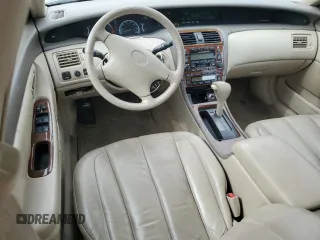 2000 Toyota Avalon XL z VIN 4T1BF28B8YU008033, wystawiony jako Copart lot #45644285 z przebiegiem 144 772 mil mil oraz Szkoda całkowita • Salvage title. Historia ofert i sprzedaży dostępna na DreamBid. Obrazek 8.