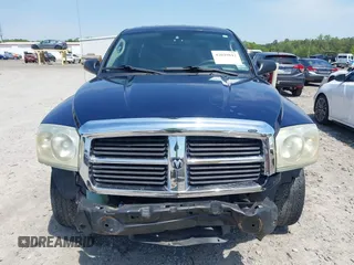 2005 Dodge Dakota SLT with VIN 1D7HW48N05S113487, listed as a IAAI auction lot 42029813 with 229,025 mi miles. Bid and sale history available at carsss.com. Image 13.