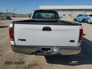 2000 Ford F-150 XL with VIN 1FTZF1825YKB19373, listed as a Copart auction lot 52078555 with 124,452 mi miles and Salvage title. Bid and sale history available at DreamBid. Image 6.