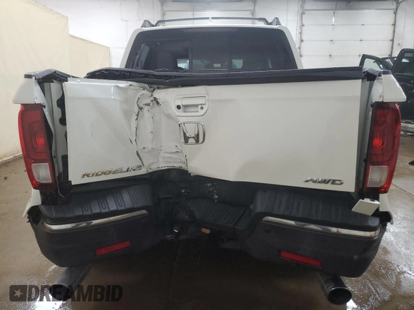2018 Honda Ridgeline RTL-E with VIN 5FPYK3F74JB001049, listed as a Copart auction lot 57590075 with 111,848 mi miles and Clean title. Bid and sale history available at DreamBid. Image 6.