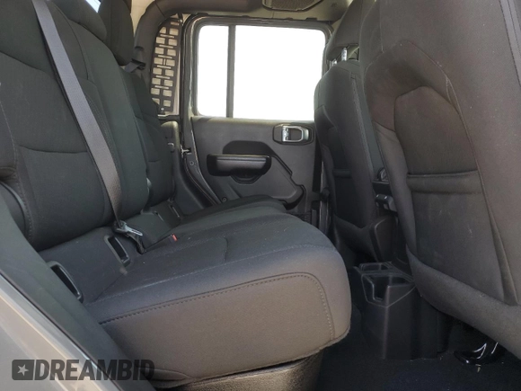 2020 Jeep Gladiator Sport S с VIN 1C6HJTAG3LL217002, выставлен на аукционе Copart как лот 52535955 с пробегом 101 761 миль миль и Списание • Salvage title. История ставок и продаж доступна на DreamBid. Изображение 10.