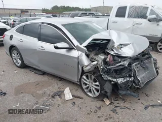 2018 Chevrolet Malibu LT z VIN 1G1ZD5ST6JF261270, wystawiony jako IAAI lot #41932928 z przebiegiem 127 971 mil mil oraz . Historia ofert i sprzedaży dostępna na DreamBid. Obrazek 1.