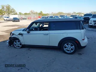 2013 MINI Clubman z VIN WMWZF3C54DT491236, wystawiony jako IAAI lot #41663705 z przebiegiem 90 046 mil mil oraz . Historia ofert i sprzedaży dostępna na DreamBid. Obrazek 14.