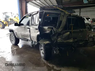 1998 Jeep Grand Cherokee Limited with VIN 1J4GZ78S9WC308708, listed as a Copart auction lot 79315694 with 205,976 mi miles and Salvage Title. Bid and sale history available at carsss.com. Image 2.