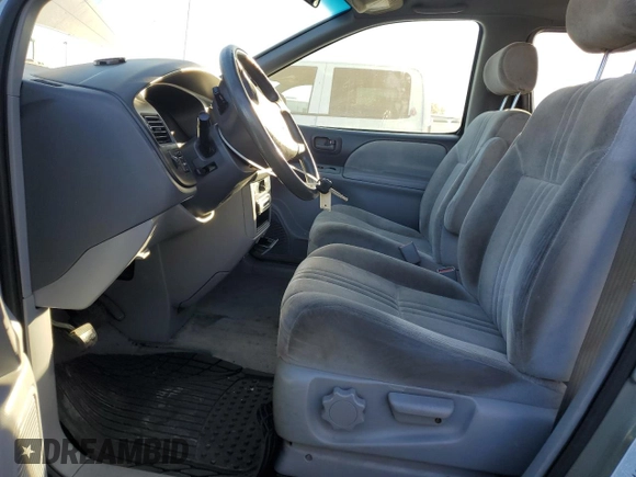 1999 Toyota Sienna CE with VIN 4T3ZF19C2XU100132, listed as a Copart auction lot 75251124 with 217,399 mi miles and Salvage Title. Bid and sale history available at carsss.com. Image 7.