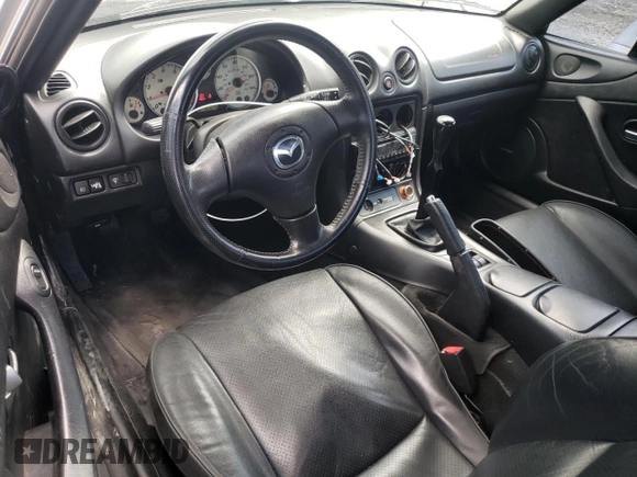 2004 Mazda MX-5 Miata LS with VIN JM1NB353640400140, listed as a Copart auction lot 56127165 with 123,276 mi miles and Salvage title. Bid and sale history available at DreamBid. Image 8.
