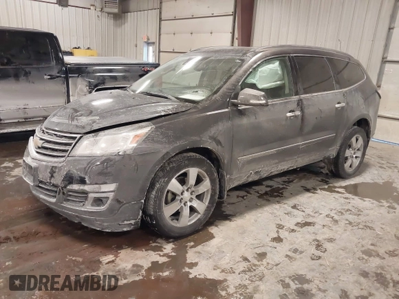 2015 Chevrolet Traverse LTZ with VIN 1GNKVJKD8FJ360899, listed as a IAAI auction lot 41634924 with 165,835 mi miles and . Bid and sale history available at DreamBid. Image 2.