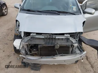 2010 Toyota Yaris with VIN JTDKT4K33A5314776, listed as a IAAI auction lot 41570383 with 167,428 mi miles. Bid and sale history available at carsss.com. Image 6.