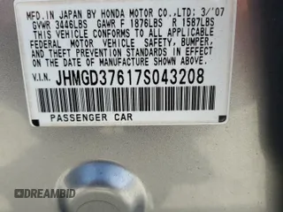 2007 Honda Fit Sport with VIN JHMGD37617S043208, listed as a Copart auction lot 64594825 with 210,672 mi miles and Clean title. Bid and sale history available at DreamBid. Image 12.