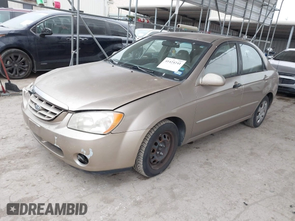2004 Kia Spectra LX with VIN KNAFE121245064294, listed as a IAAI auction lot 41424241 with 110,136 mi miles. Bid and sale history available at carsss.com. Image 17.