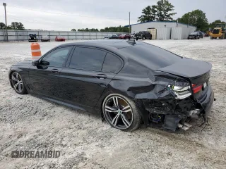 2019 BMW 7 Series 750i with VIN WBA7F0C57KGM25906, listed as a Copart auction lot 62728443 with 61,561 mi miles. Bid and sale history available at carsss.com. Image 2.