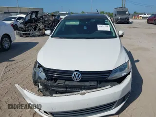 2013 Volkswagen Jetta TDI w/Premium with VIN 3VWLL7AJXDM392313, listed as a IAAI auction lot 42131758 with 98,618 mi miles and . Bid and sale history available at DreamBid. Image 12.