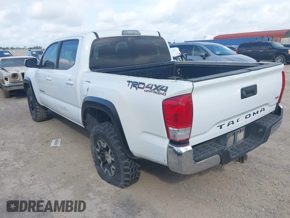 2018 Toyota Tacoma SR with VIN 3TMCZ5AN6JM138747, listed as a IAAI auction lot 42684725 with 144,725 mi miles and . Bid and sale history available at DreamBid. Image 3.
