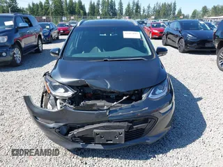 2017 Chevrolet Bolt EV Premier z VIN 1G1FX6S05H4190932, wystawiony jako IAAI lot #42422197 z przebiegiem 59 836 mil mil oraz . Historia ofert i sprzedaży dostępna na DreamBid. Obrazek 12.