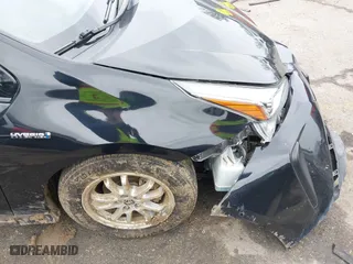 2019 Toyota Prius L Eco with VIN JTDKARFU6K3074058, listed as a IAAI auction lot 41741499 with 70,834 mi miles. Bid and sale history available at carsss.com. Image 6.