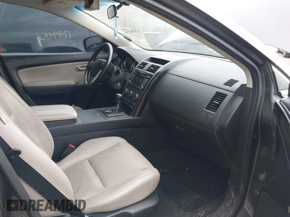 2015 Mazda CX-9 Touring with VIN JM3TB2CA5F0452775, listed as a IAAI auction lot 42659258 with 129,948 mi miles and . Bid and sale history available at DreamBid. Image 5.